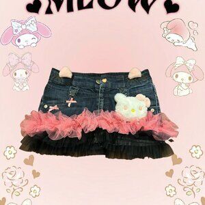 Adorable Hello Kitty denim skirt with frilly hem and cute bows